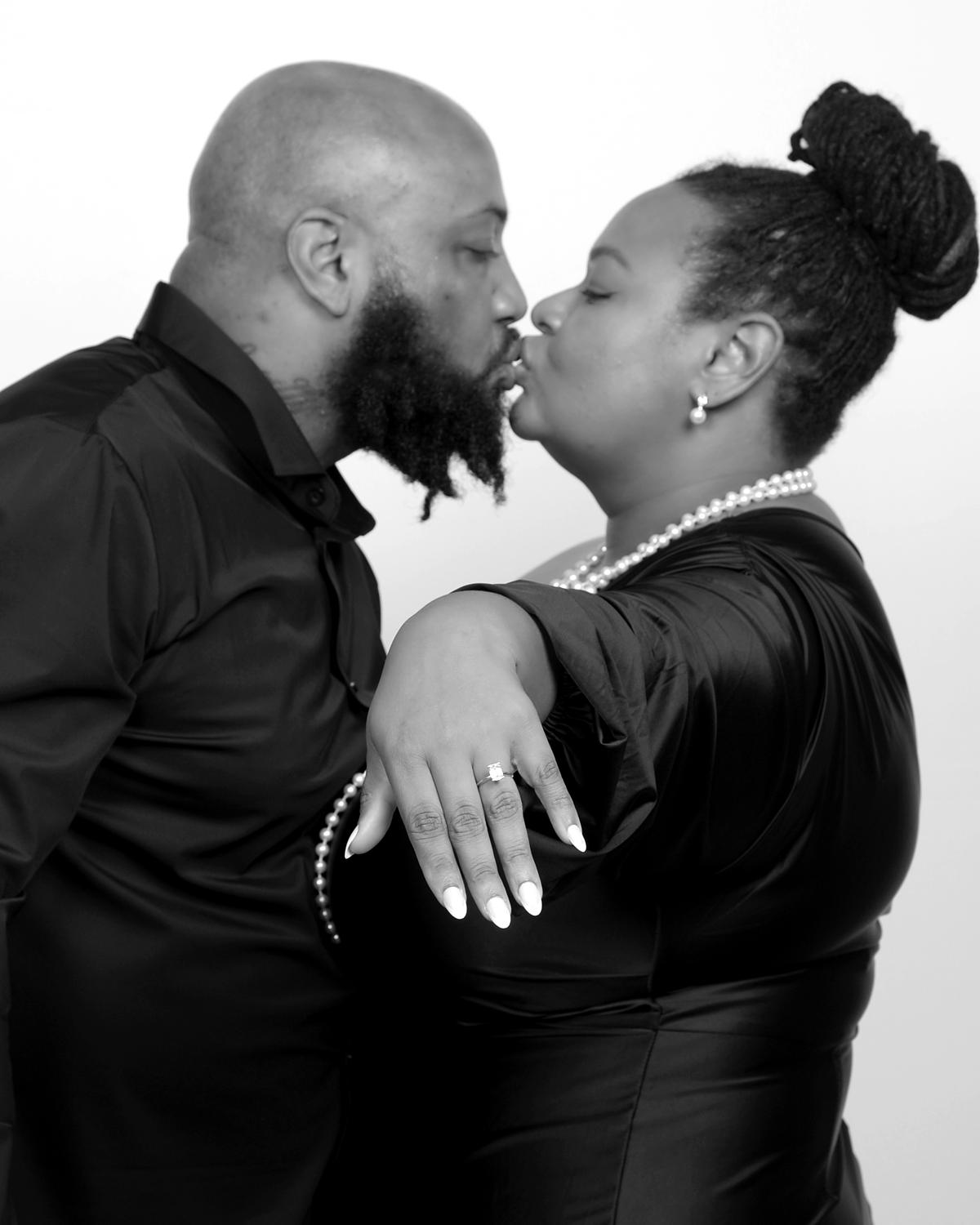 Juliette and Anthony share a kiss as she shows her engagement ring